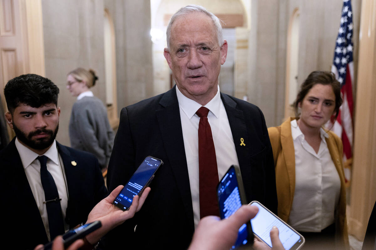 Benny Gantz, a member of Israel’s war cabinet, talks to the media after a meeting with Senate ...