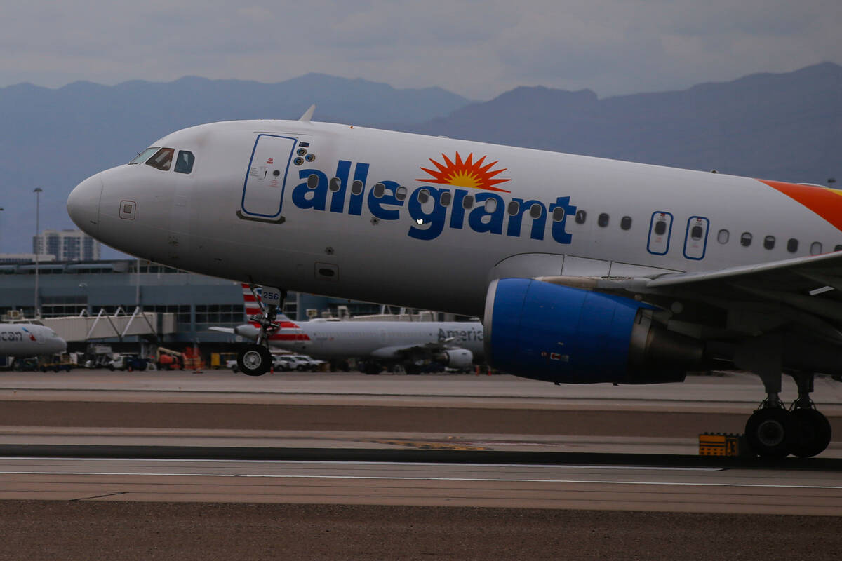 An Allegiant Air plane lands at Harry Reid International Airport on Tuesday, July 26, 2022, in ...