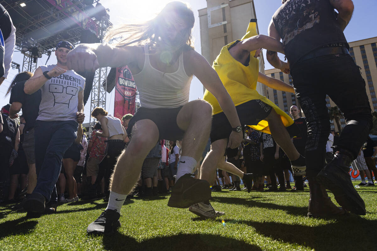 Festival attendees mosh during the Punk Rock Bowling music festival at Downtown Las Vegas Event ...