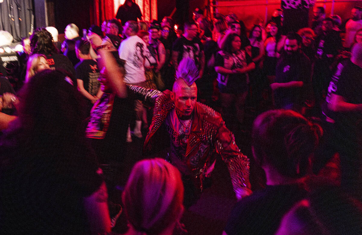 Festival attendees mosh as The Meteors perform during a Punk Rock Bowling music festival club s ...