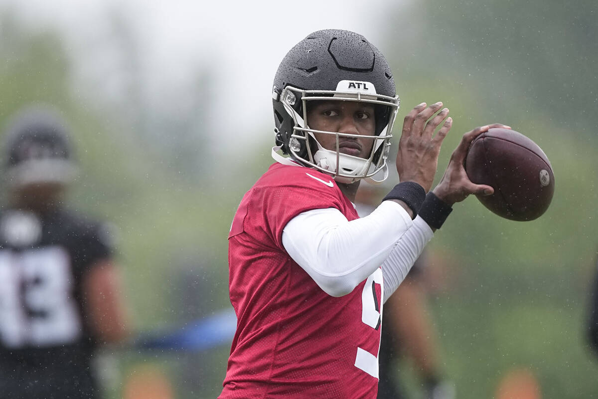 Atlanta Falcons quarterback Michael Penix Jr., runs drills during an NFL football mini training ...