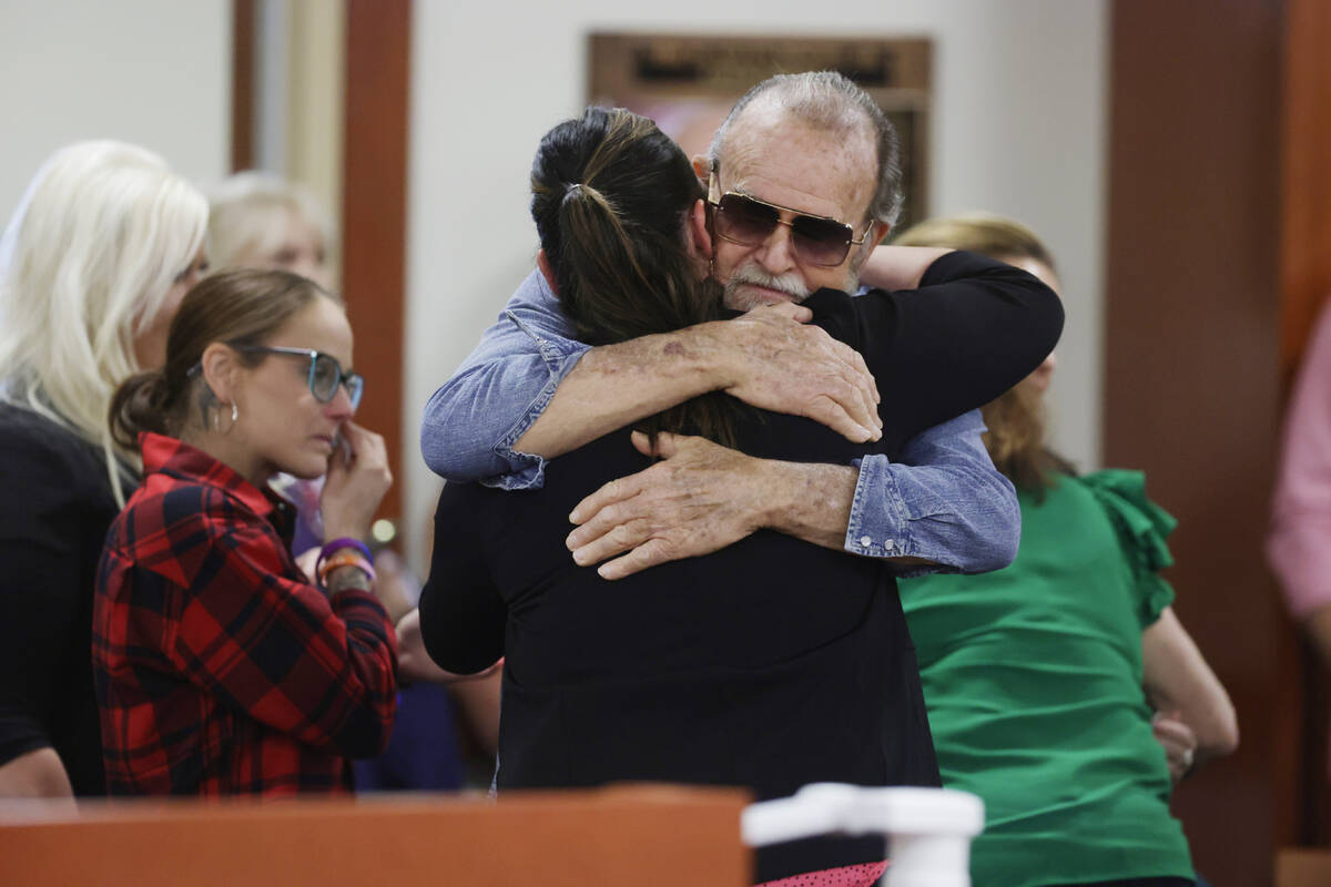 Larry Woodcock, gets a hug after the verdict in the Chad Daybell murder trial was read at the A ...