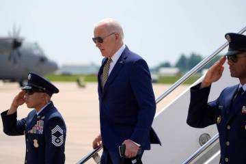 President Joe Biden arrives on Air Force One at Delaware Air National Guard Base in New Castle, ...