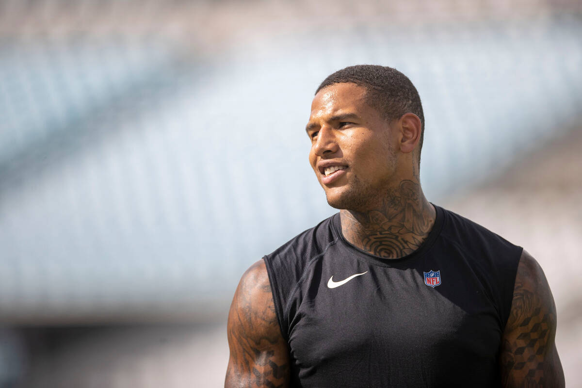 Raiders tight end Darren Waller warms up before an NFL game against the Jacksonville Jaguars at ...