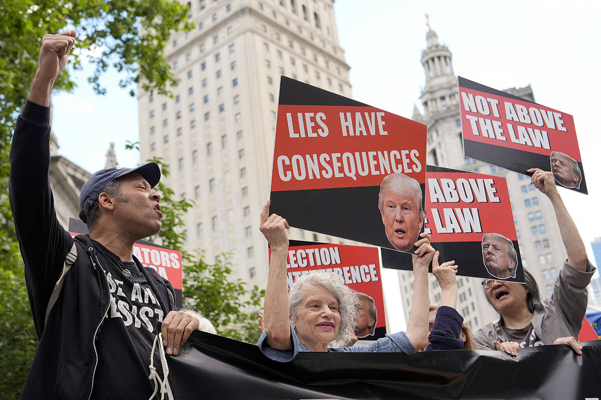 People react to the guilty verdict announced against former President Donald Trump outside Manh ...