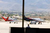Private planes line the tarmac at Henderson Executive Airport, on Friday, May 31, 2024. (Bizuay ...