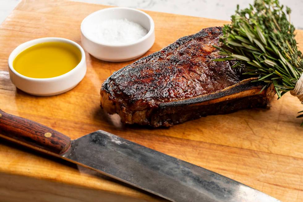 A dry-aged bone-in New York steak from Brezza, one of the restaurants participating in the Las ...