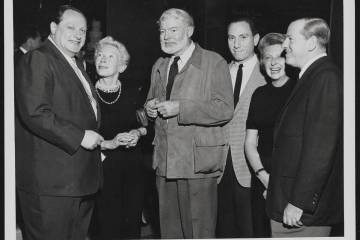 Ernest Hemingway, center, is seen during a 1959 visit to Las Vegas. (Las Vegas News Bureau)
