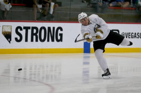 Vegas Golden Knights forward Nick Suzuki shoots during the first day of development camp at Cit ...
