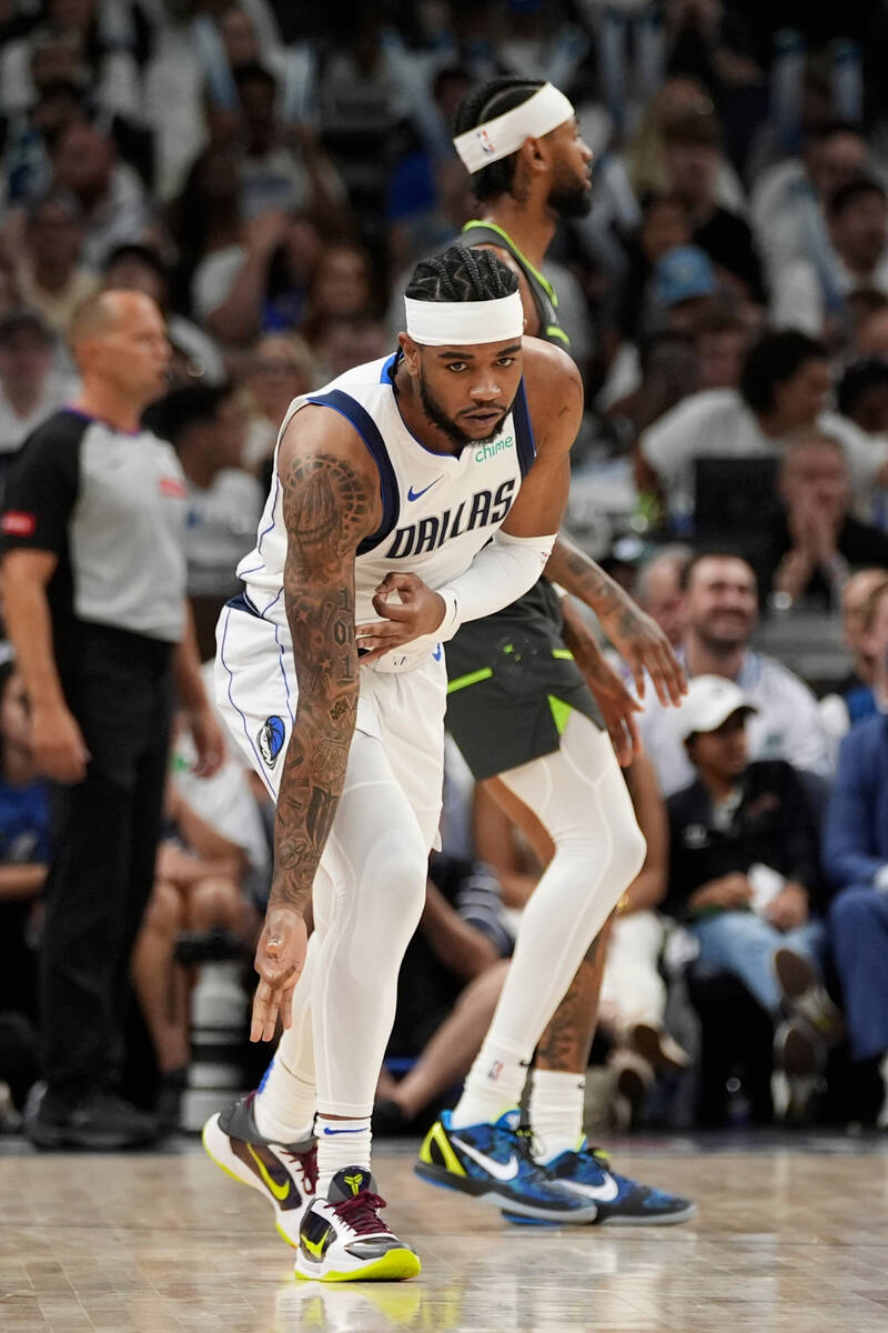 Dallas Mavericks guard Jaden Hardy celebrates a made 3-pointer against the Minnesota Timberwolv ...