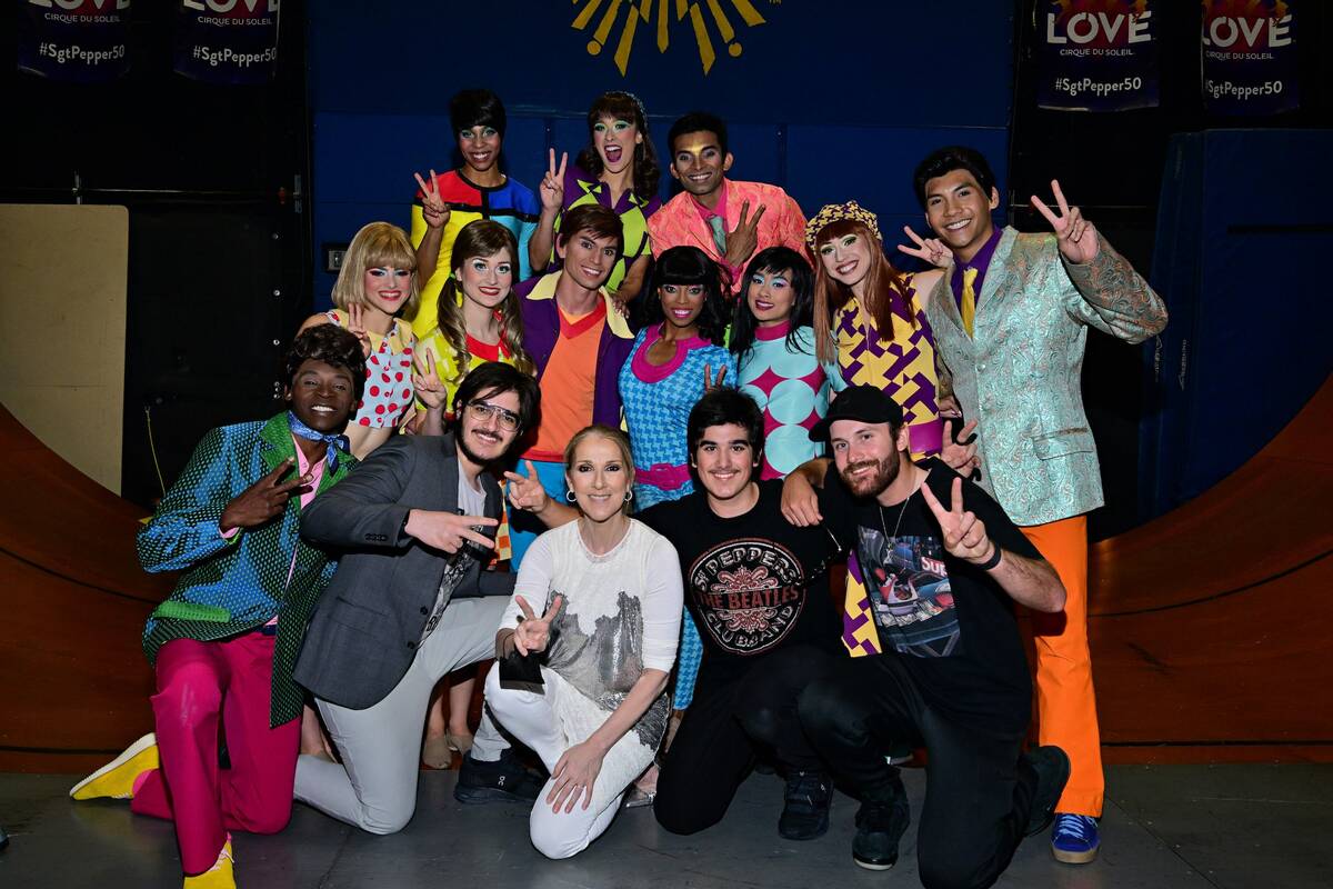 Celine Dion and her family are shown backstage with cast members of "Love" at the Mirage on Fri ...