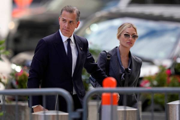 Hunter Biden, left, and his wife, Melissa Cohen Biden, arrive at federal court, Monday, June 3, ...