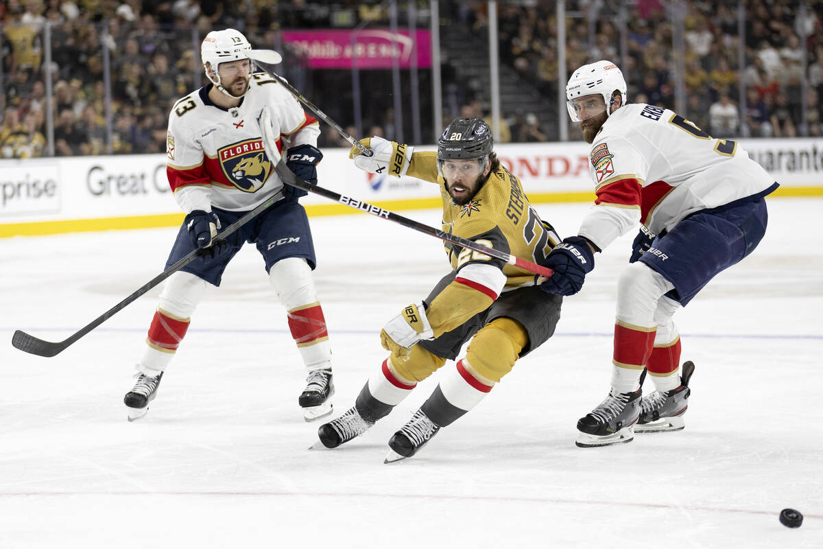 Golden Knights center Chandler Stephenson (20) skates for the puck against Florida Panthers cen ...