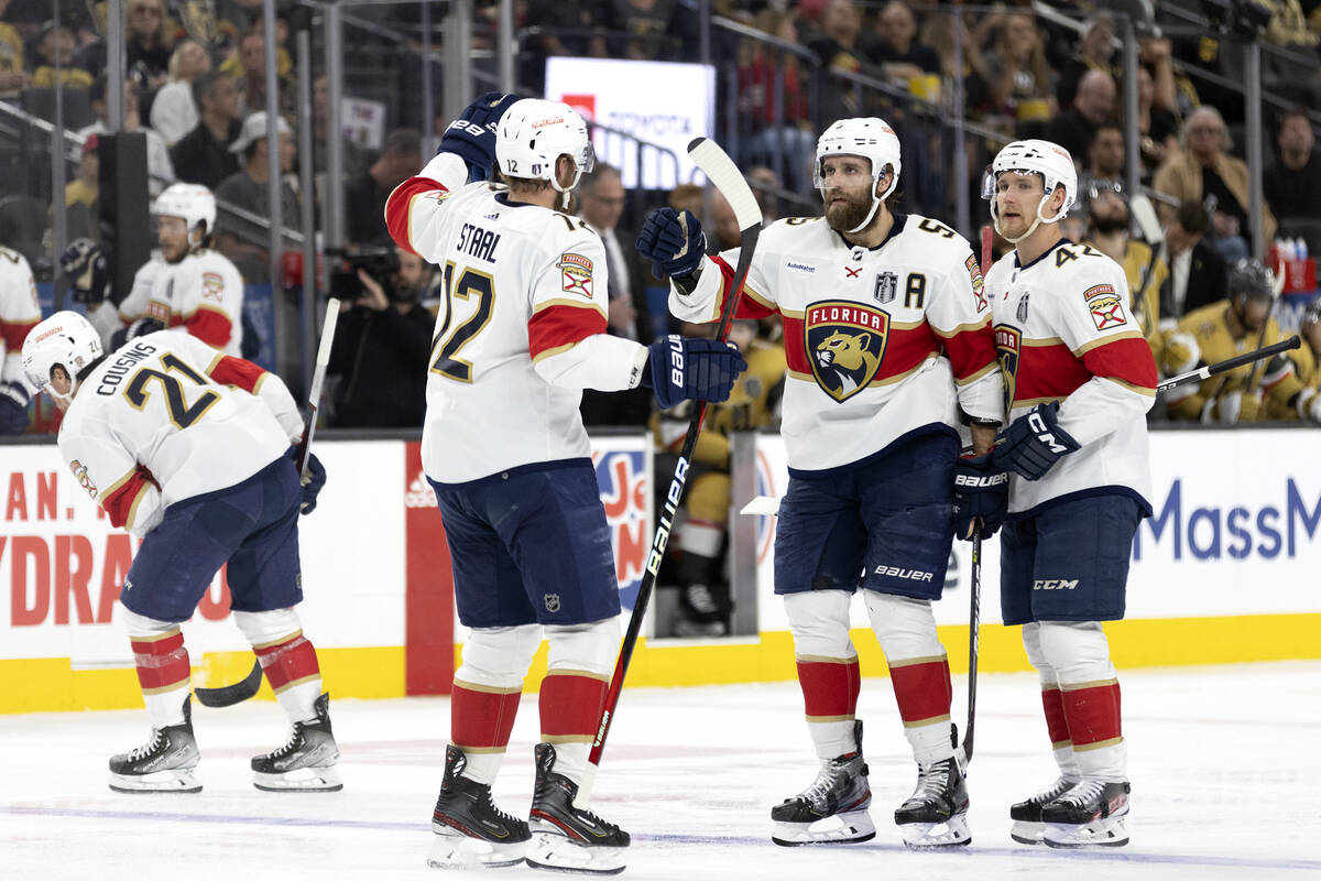 The Florida Panthers celebrate after Panthers defenseman Aaron Ekblad (5) scored during the sec ...