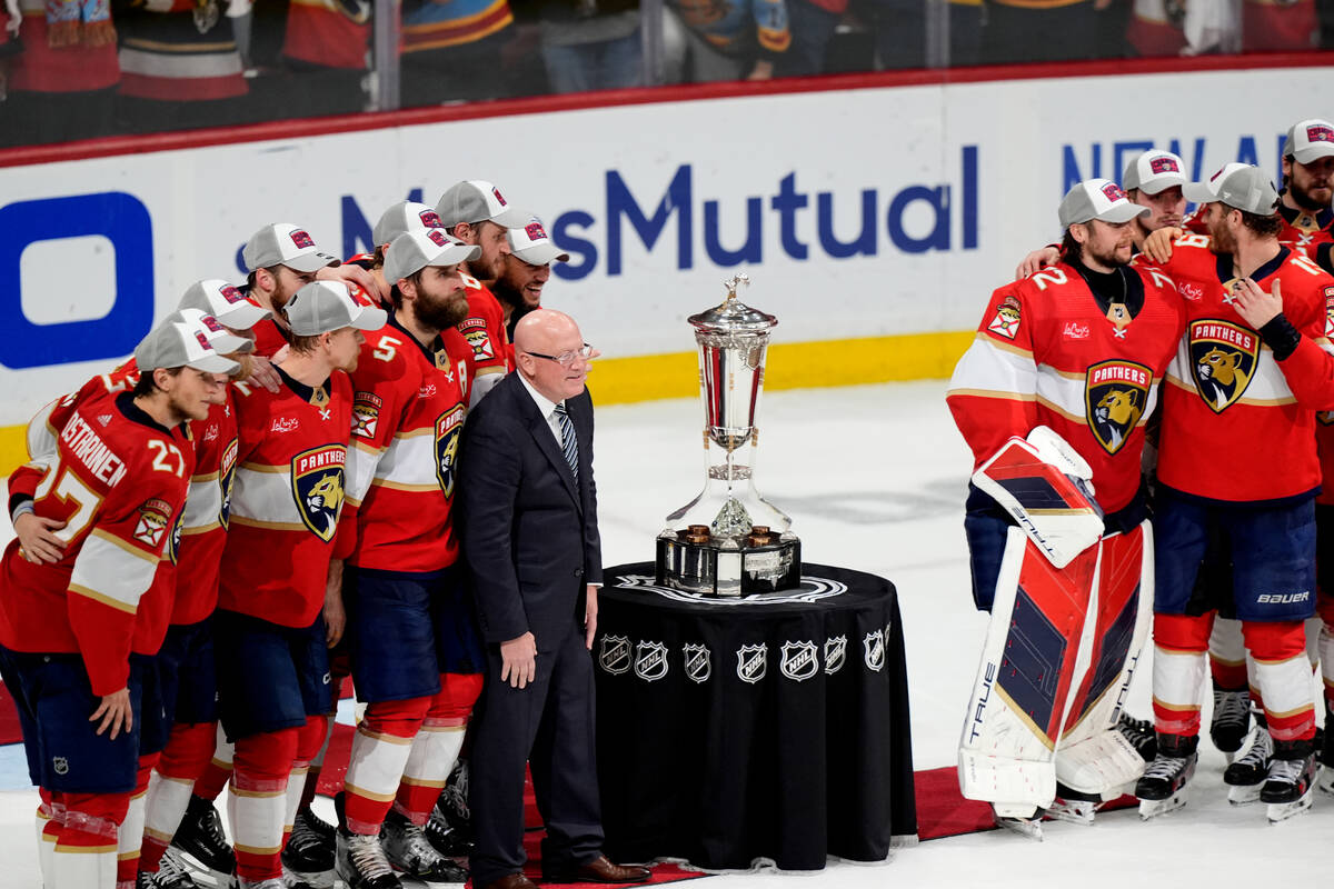 Bill Daly, deputy commissioner of the NHL, center left, poses with the Florida Panthers and the ...