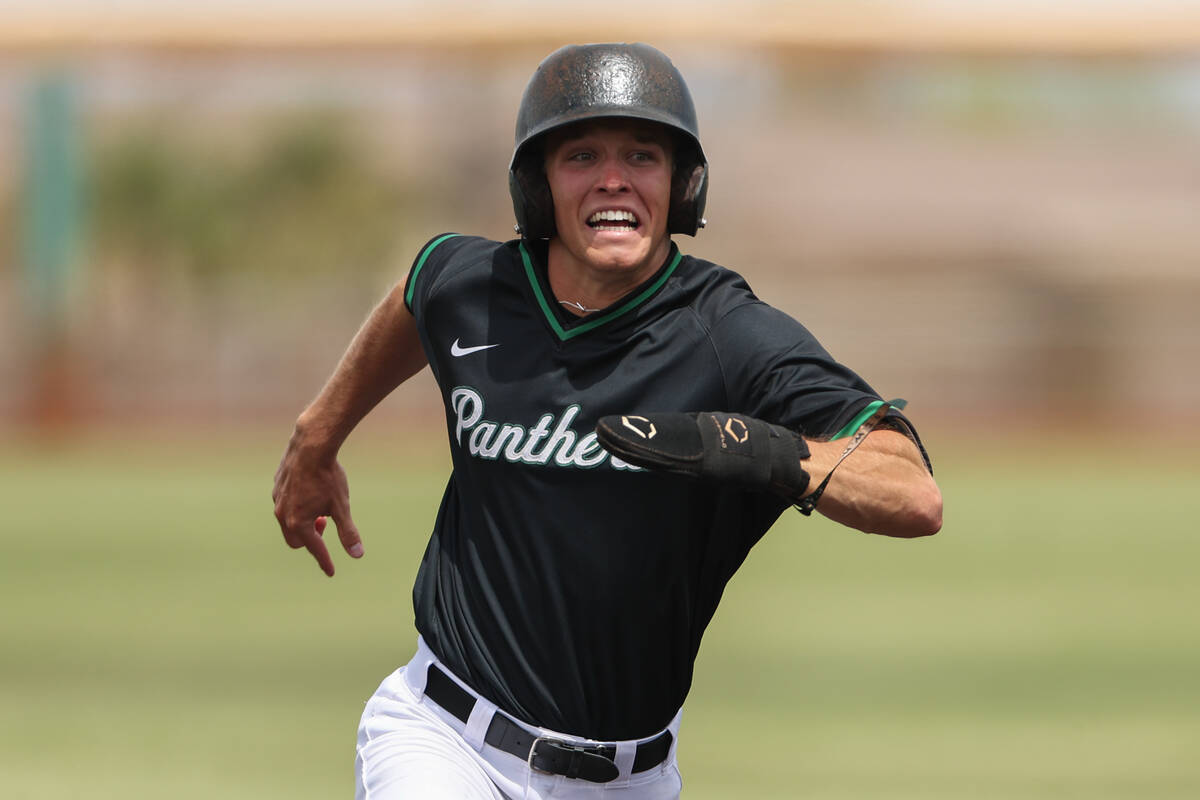Palo Verde infielder Drew Kaplan (15) sprints around the bases before scoring during a Class 5A ...