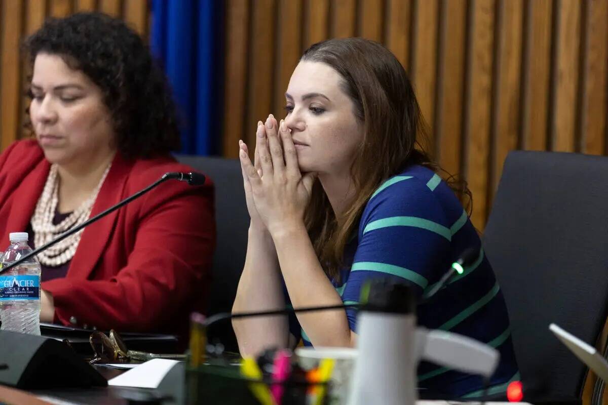 Clark County School District trustee Katie Williams, right, appears at a school board meeting w ...