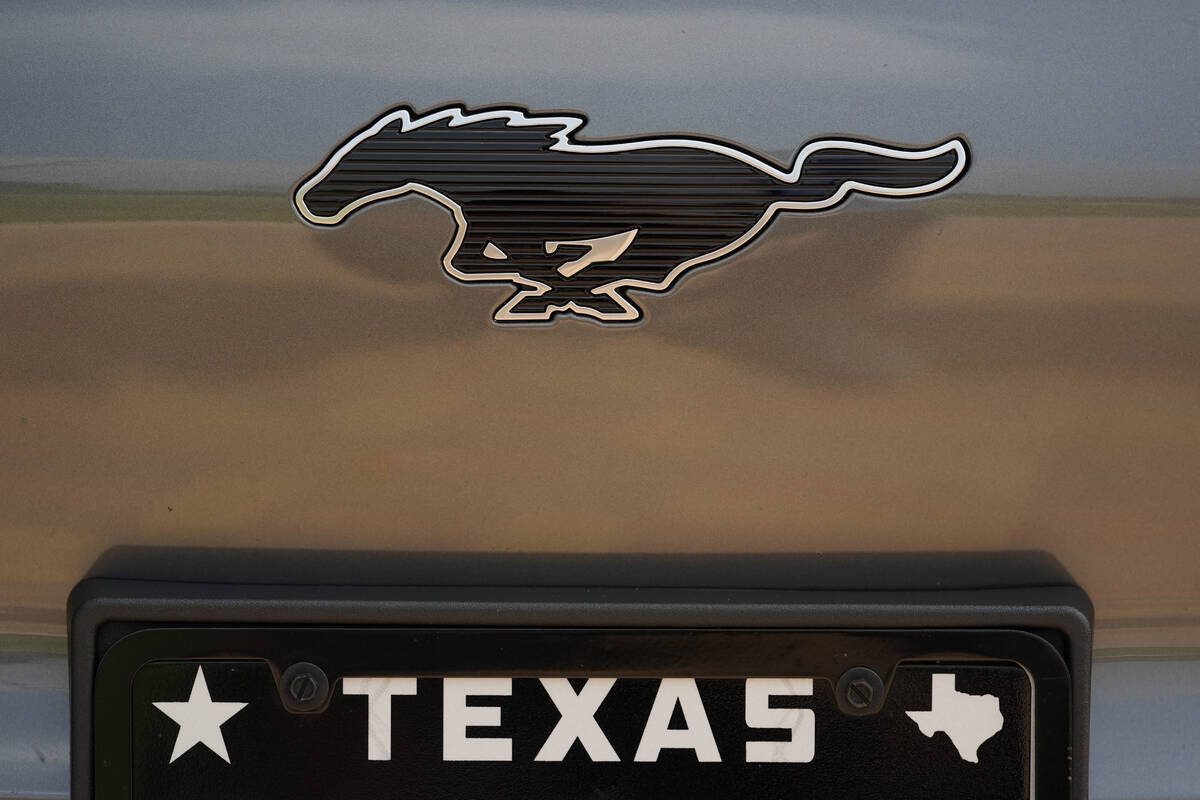 A Ford Mustang Mach-E logo is seen of a vehicle Thursday, May 9, 2024, in San Antonio. Many Ame ...