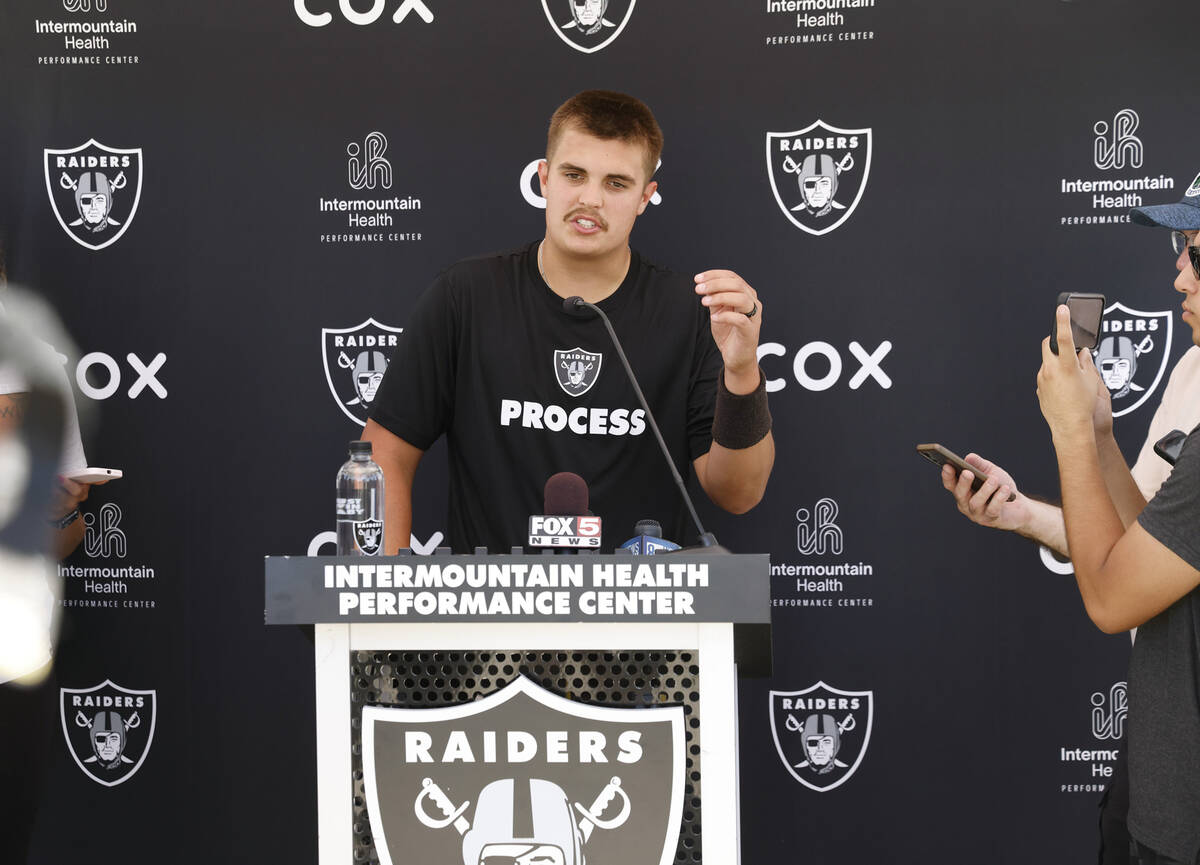 Raiders quarterback Aidan O'Connell (12) addresses the media after organized team activities at ...