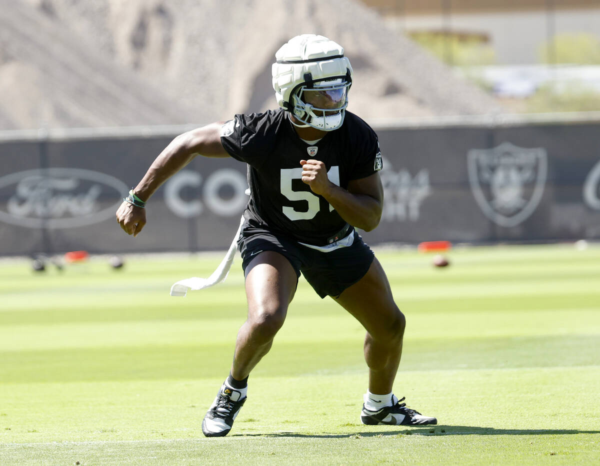 Raiders team's defensive end Malcolm Koonce runs through drills during organized team activitie ...