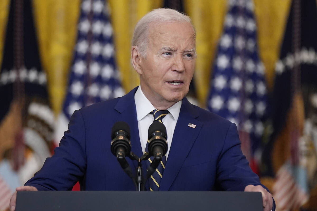 President Joe Biden speaks about an executive order in the East Room at the White House in Wash ...