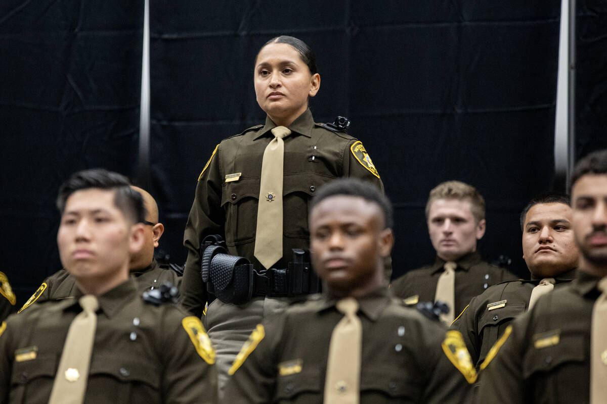 Individual graduates stand and are recognized for achievements during the Las Vegas Metro Polic ...