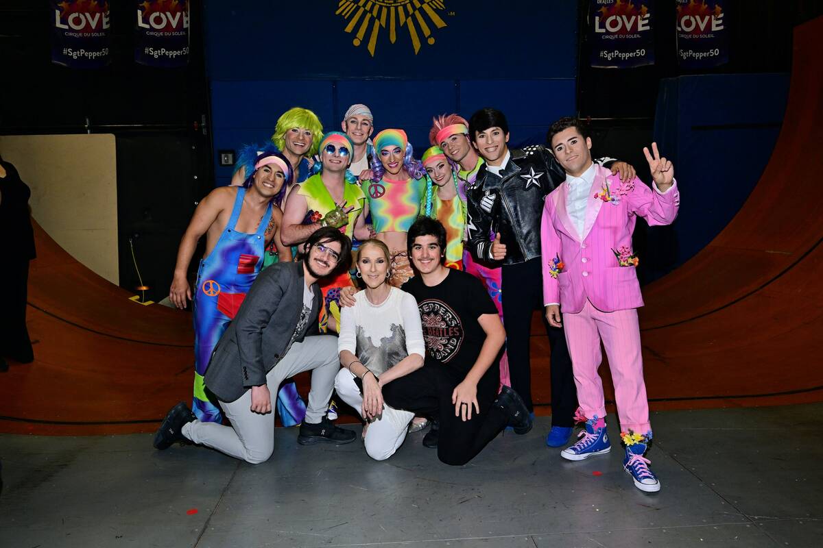 Celine Dion and her family are shown backstage with cast members of The Beatles "Love" at the M ...