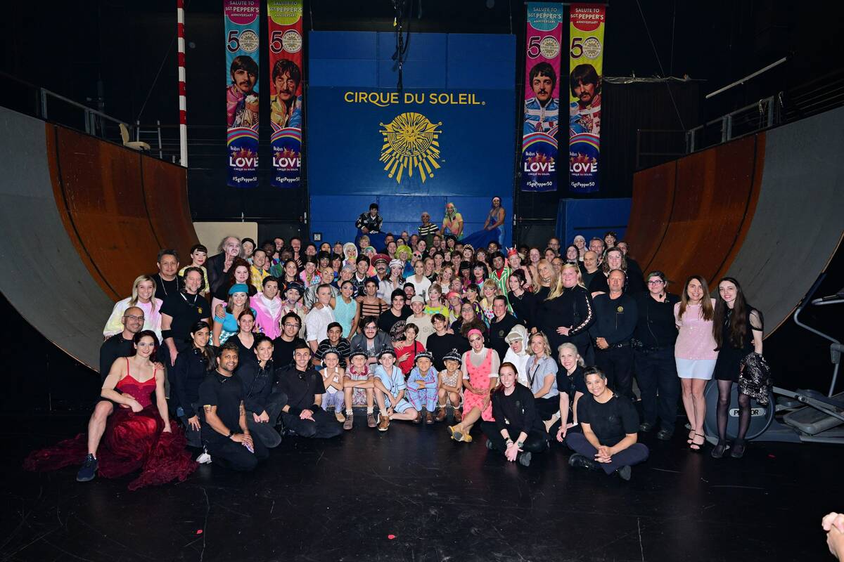 Celine Dion and her family are shown backstage with cast members of The Beatles "Love" at the M ...