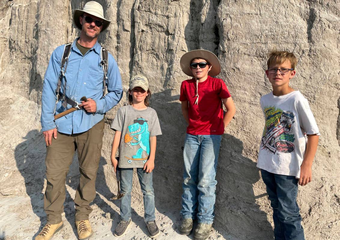 In this photo provided by Giant Screen Films, vertebrate paleontologist Tyler Lyson, left, pose ...