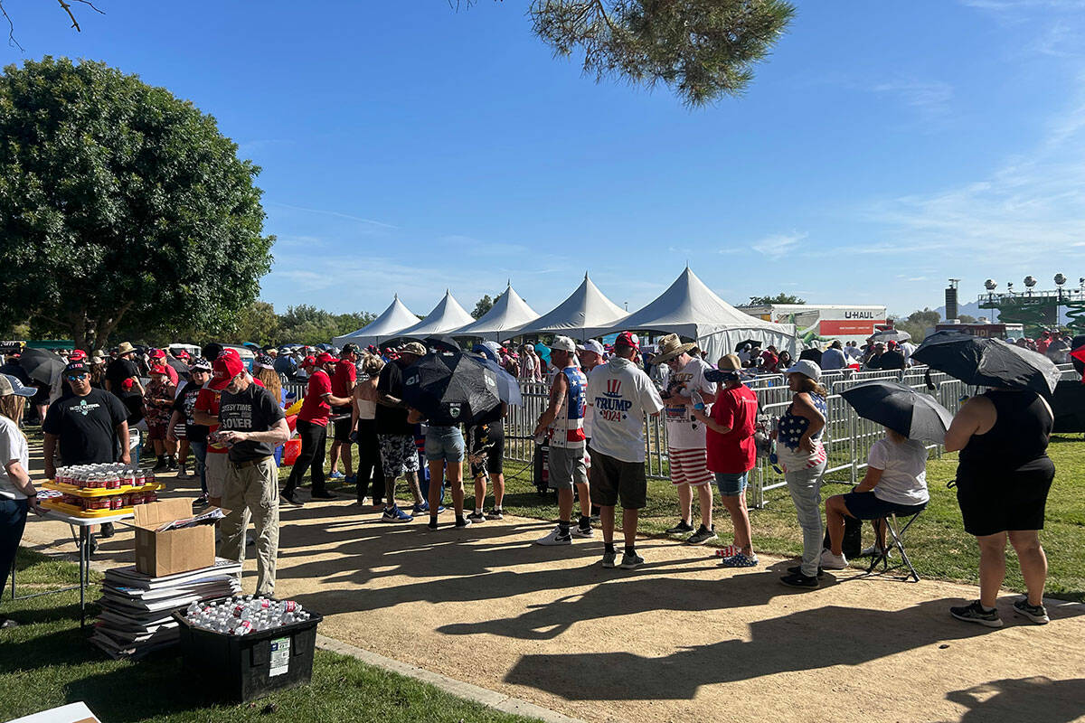 Trump supporters wait at main gates ahead of his rally at Sunset Park on June 9, 2024 (Dominic ...