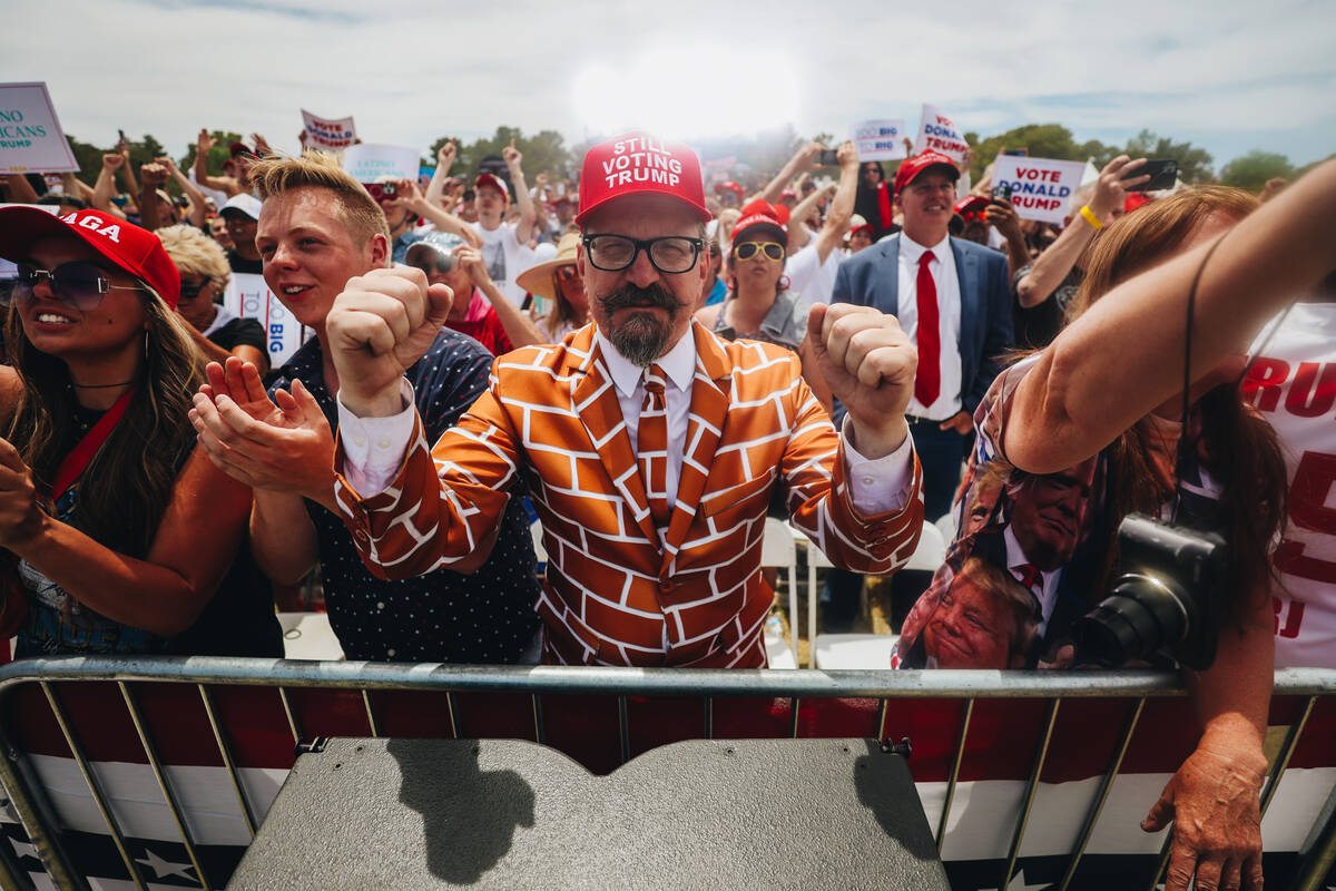 Fans cheer as former President Donald Trump speaks at a rally at Sunset Park on Sunday, June 9, ...