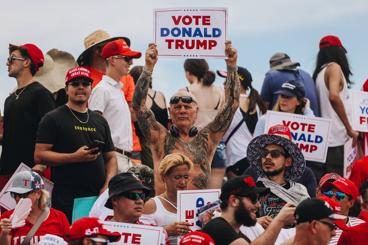 Supporters cheer as former President Donald Trump speaks at a rally at Sunset Park on Sunday, J ...