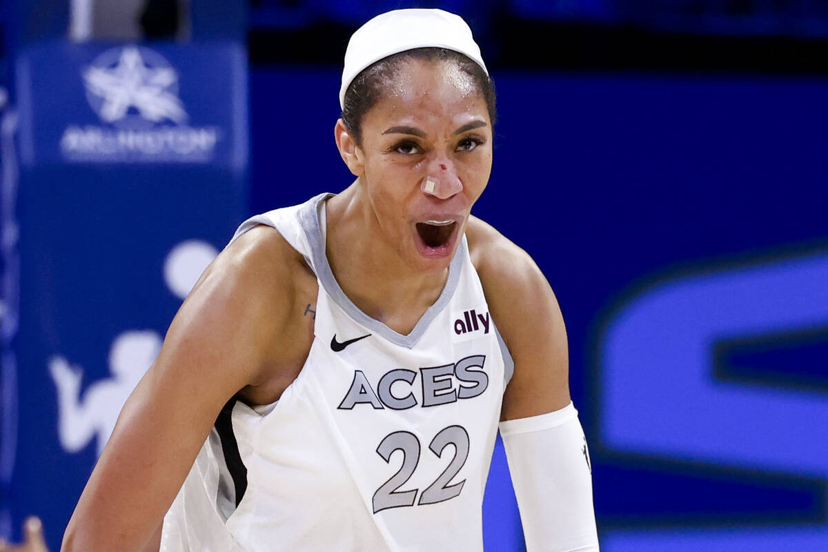 Las Vegas Aces center A'ja Wilson reacts after scoring from a three-pointer against the Dallas ...