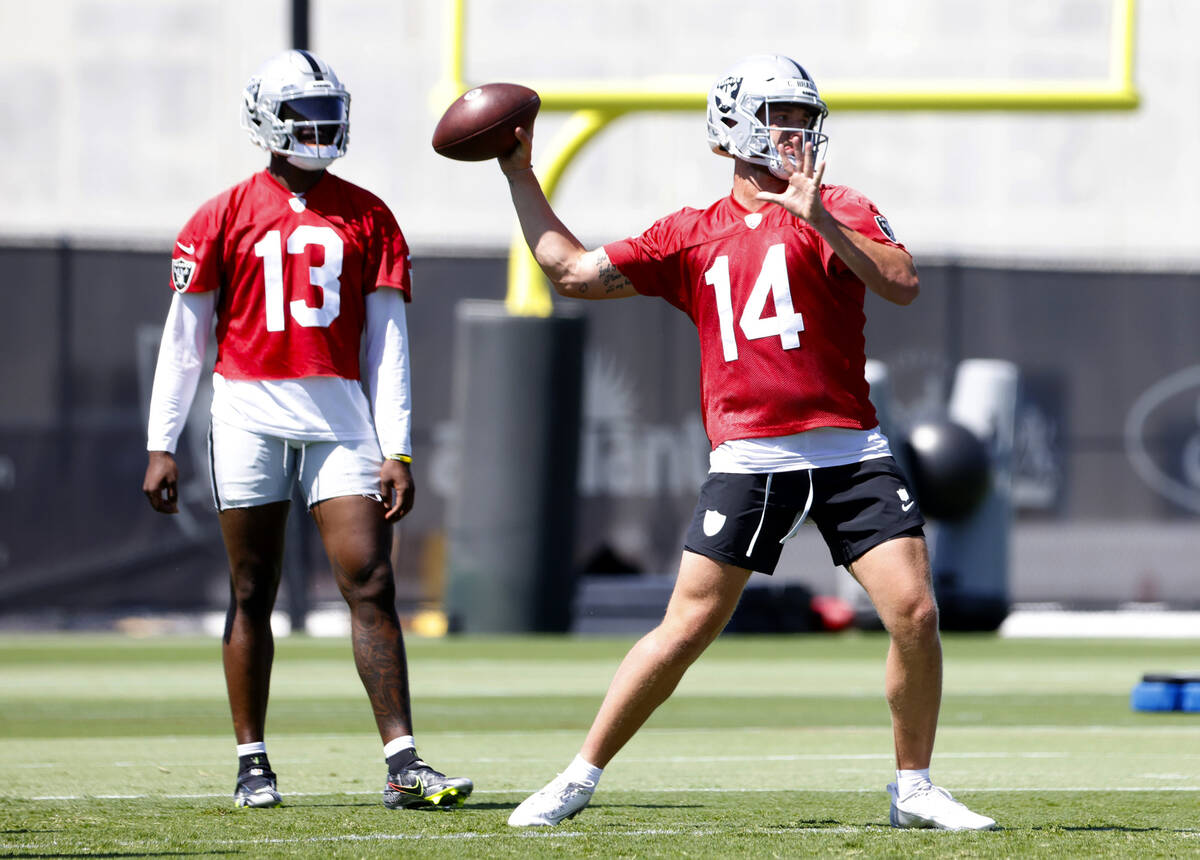 Raiders backup quarterback Carter Bradley (14) prepares to throw the ball as backup quarterback ...