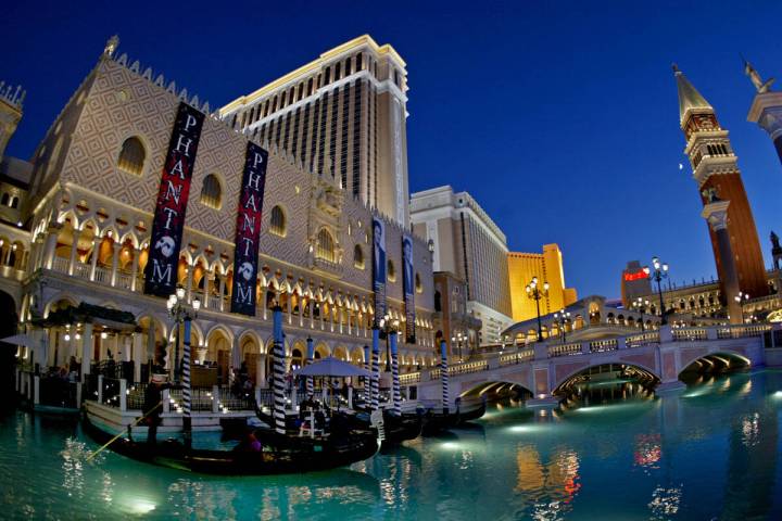 Gondolas are shown in the canals in front of the Venetian Resort-Hotel-Casino at dusk Friday, O ...