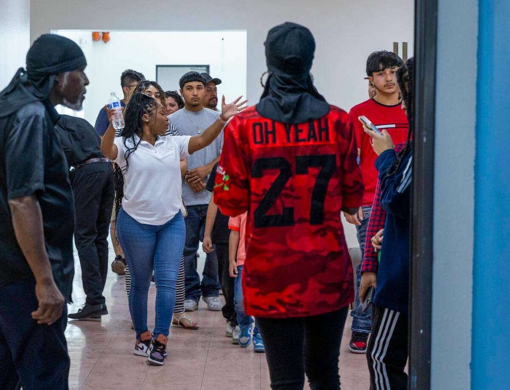 Visitors to the Southern Nevada Trades High School take a quick tour as the school opens enroll ...