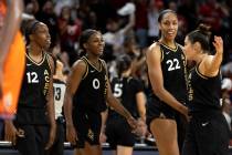 Las Vegas Aces guard Chelsea Gray (12), guard Jackie Young (0), forward A'ja Wilson (22) and gu ...