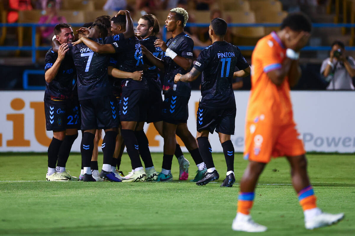 Las Vegas Lights FC celebrates after forward Khori Bennett scored a goal on Miami FC during a s ...