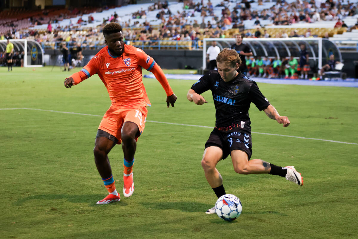 Las Vegas Lights FC midfielder Coleman Gannon (8) kicks toward the net against Miami FC defende ...