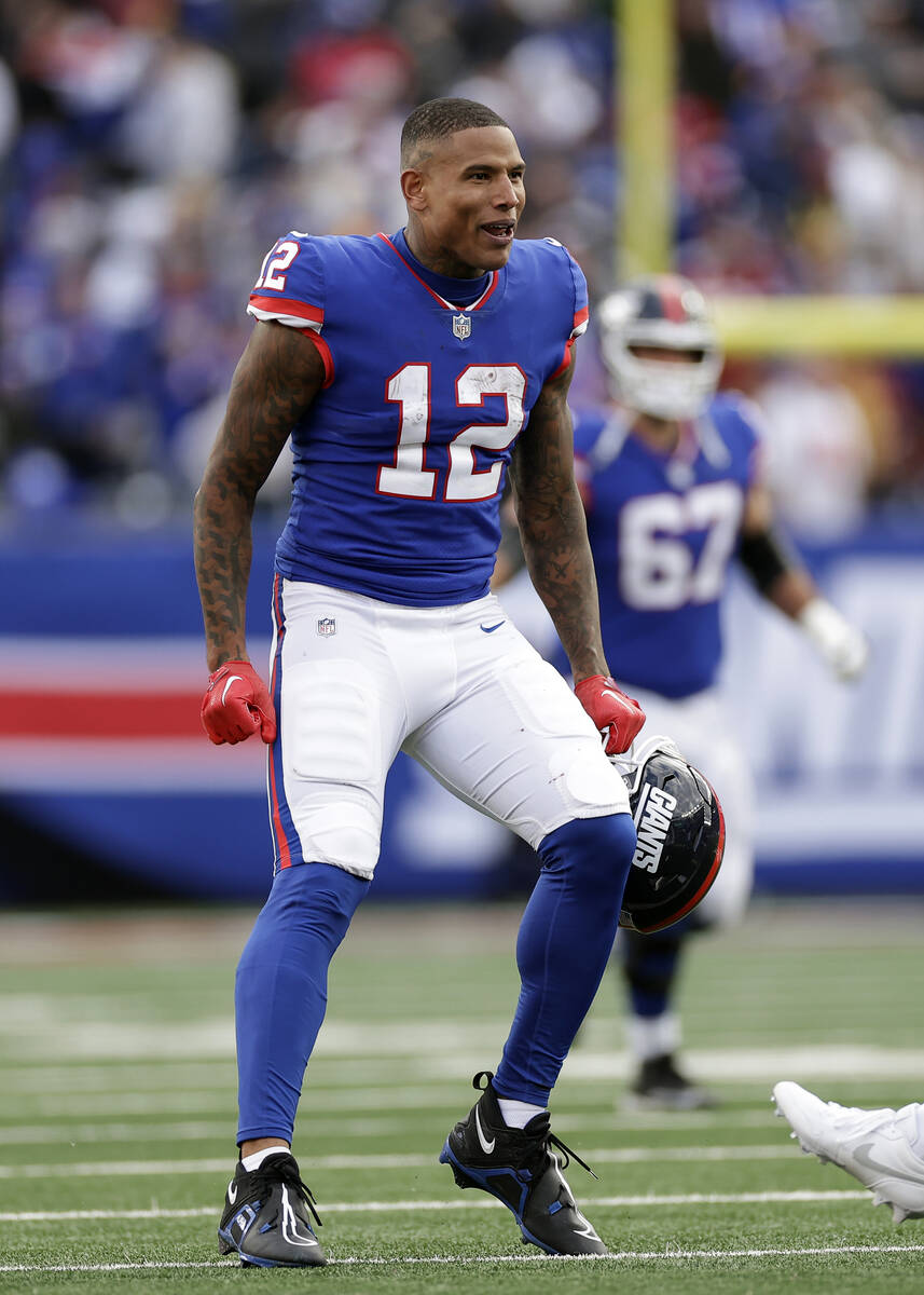 New York Giants tight end Darren Waller (12) reacts against the Washington Commanders during an ...