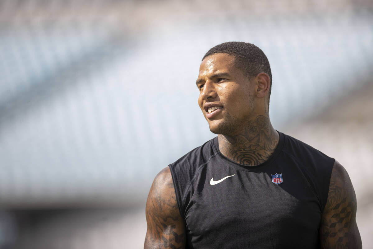 Raiders tight end Darren Waller warms up before an NFL game against the Jacksonville Jaguars at ...