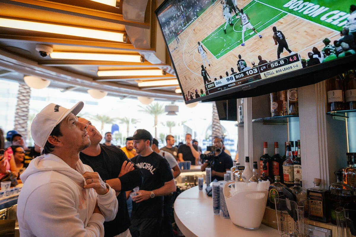 Mark Wahlberg watches the Celtics-Mavericks Game 2 of the NBA Finals during an unbilled appeara ...