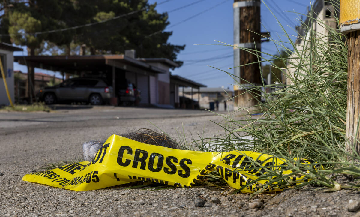 Police tape is seen near where 2-year-old Jacoby Robinson Jr. was found on the 1300 block of Le ...