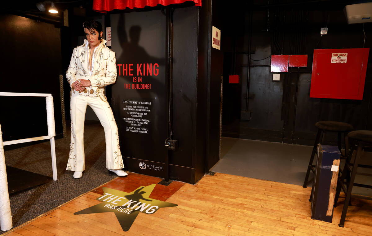 Elvis tribute artist Daniel Durston stands backstage at the Westgate in Las Vegas Friday, June ...