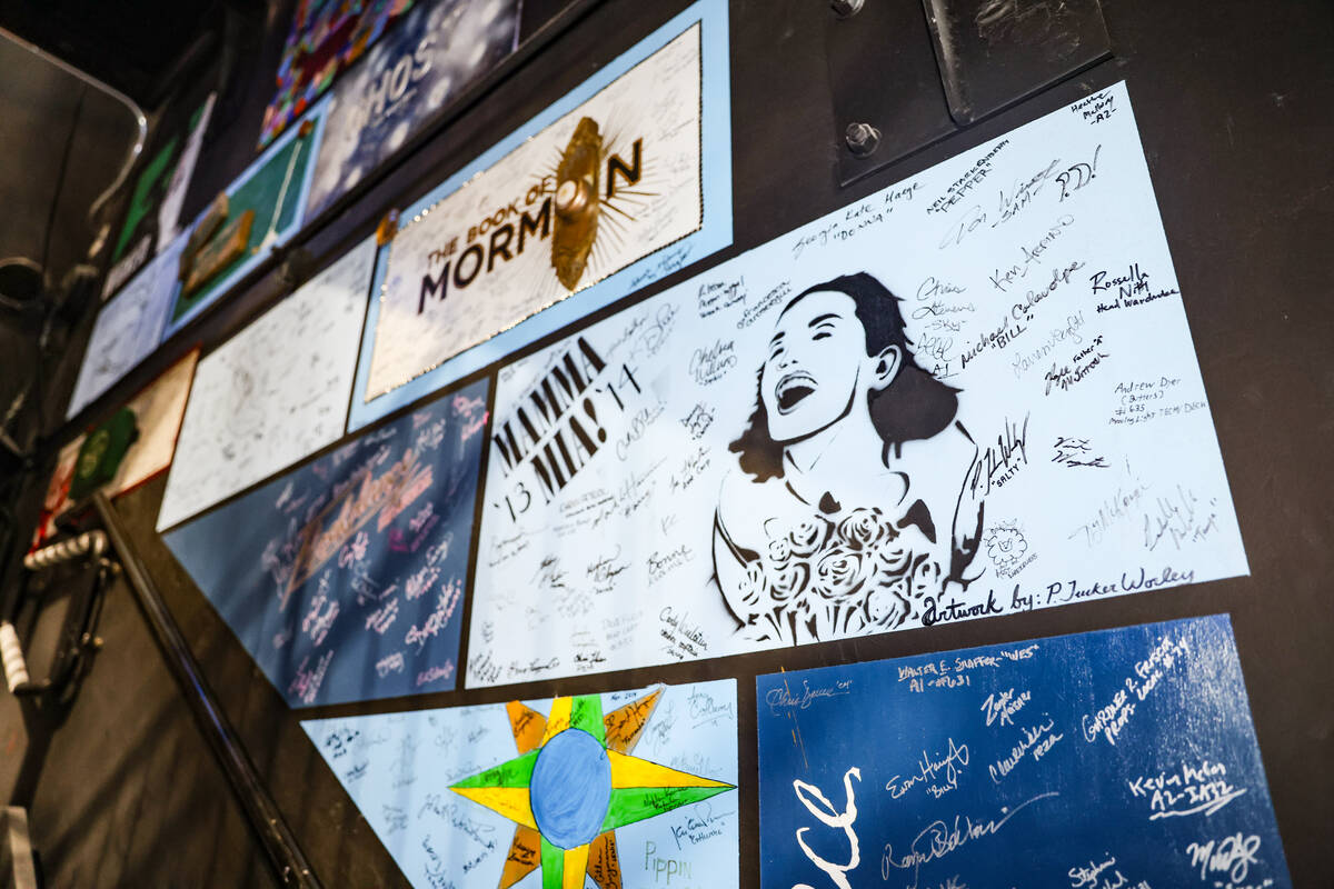 Signatures from stars adorn the backstage walls along with show posters at The Smith Center in ...