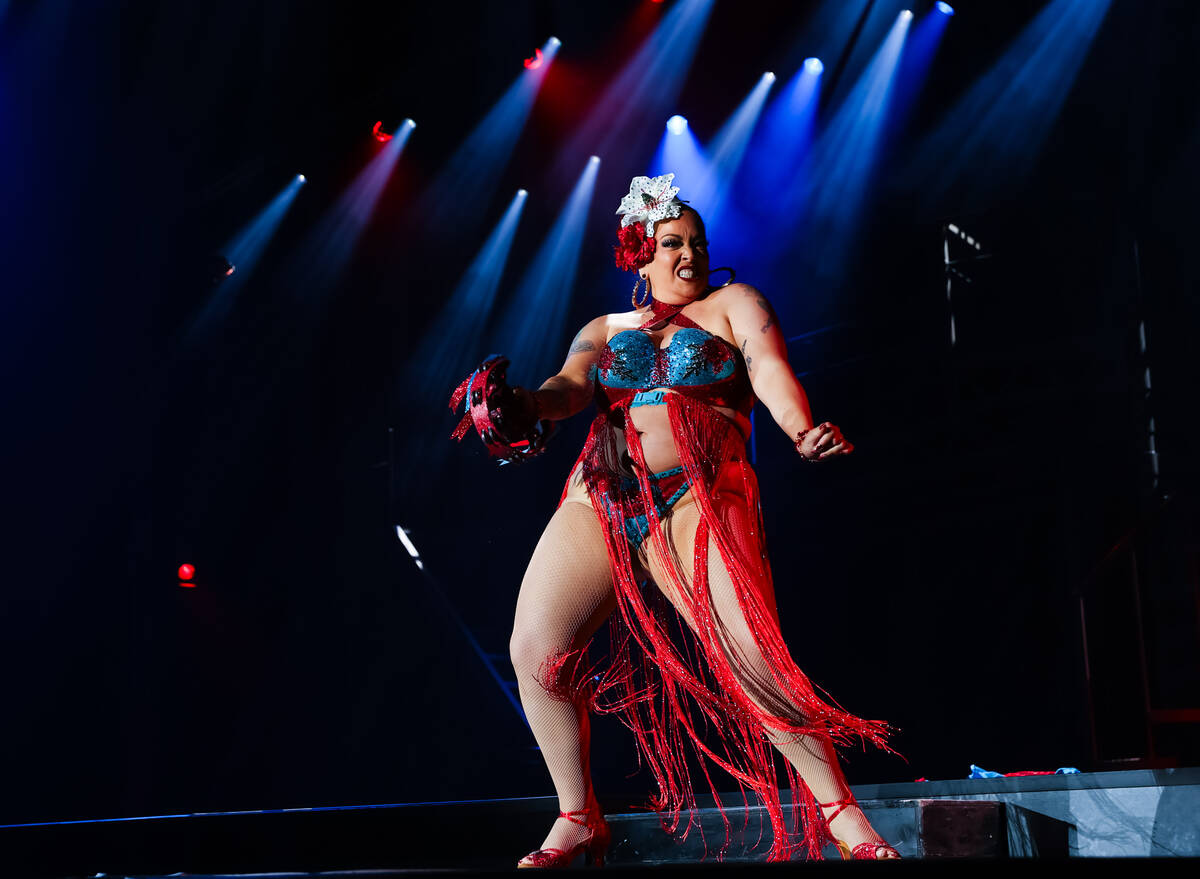 Chola Magnolia, of San Antonio, Texas, competes for M- Exotic World in the Burlesque Hall of Fa ...