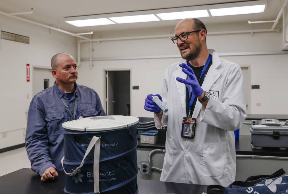 Medical entomologist Richard Oxborough, right, speaks to the Review-Journal about mosquito trap ...