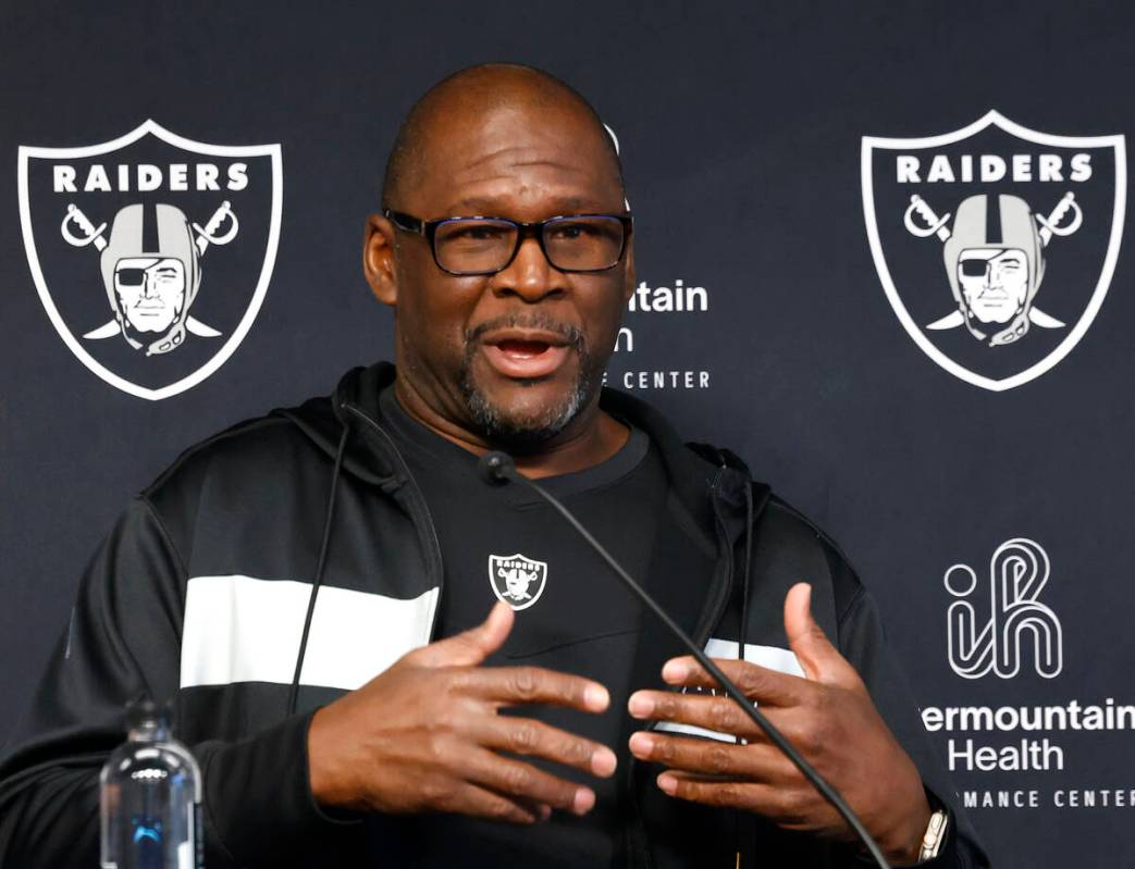 Raiders wide receivers coach Edgar Bennett addresses the media before an NFL football practice ...