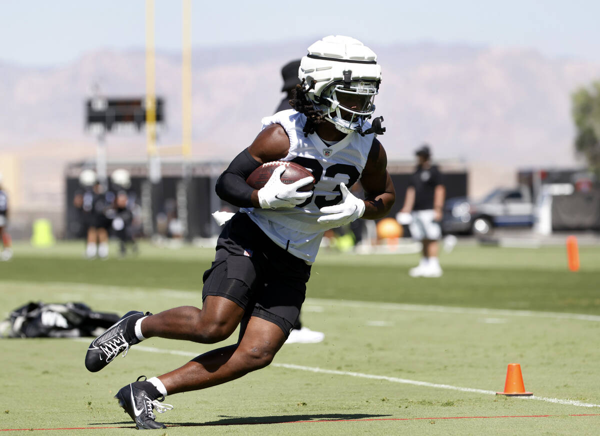 Raiders wide receiver Kristian Wilkerson (83) runs with the ball during an NFL football practic ...