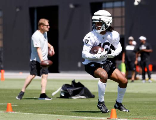Raiders wide receiver Jakobi Meyers (16) runs through drills during an NFL football practice at ...